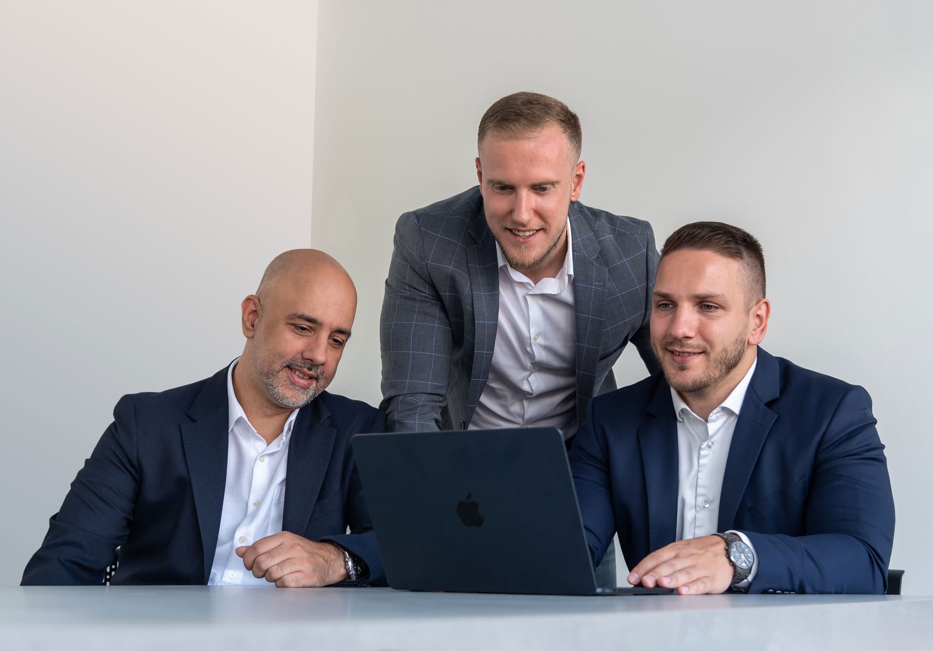 Group photo of our diverse software development team, showcasing our experts in web development, mobile app development, and IT consulting